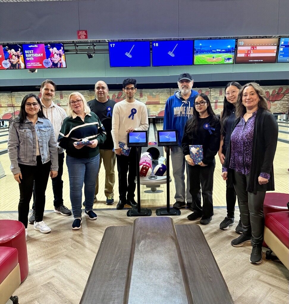 The EVAMAX team at a bowling night